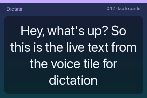 Dictation in progress on the device: the spoken sentence fills the whole panel in large type, with a timer and a “tap to paste” hint.
